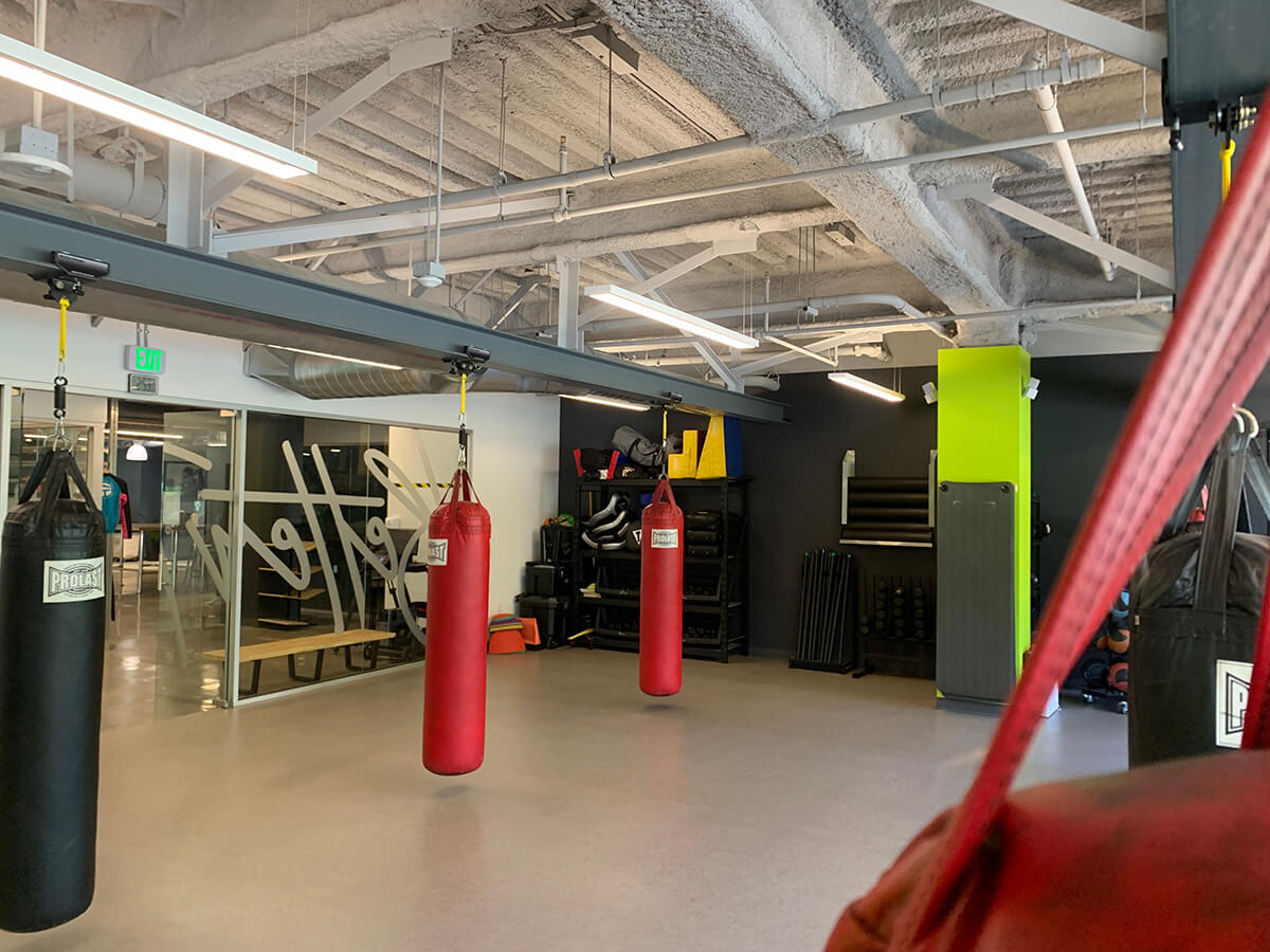 Heavy bags in the boxing area at TRIFIT LA