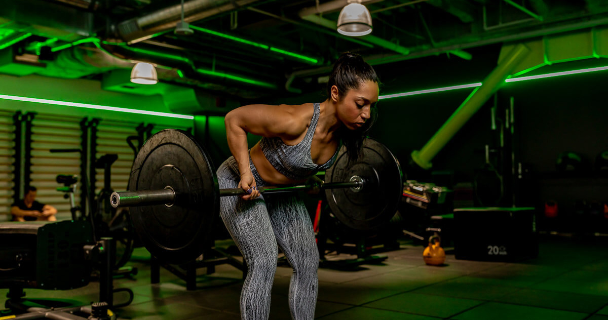 Members lifting on the strength floor