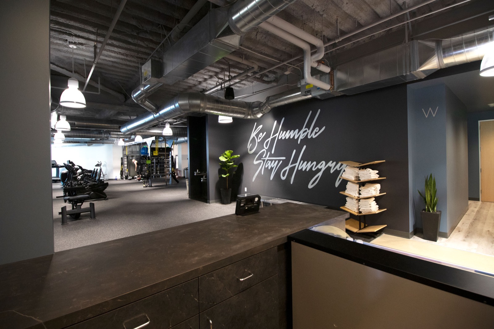 The front desk and training floor at TRIFIT LA
